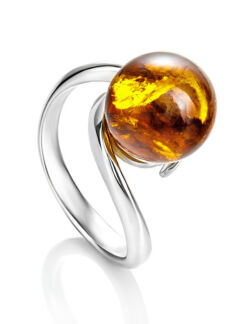 Кольцо с натуральным золотистым искрящимся янтарем «Юпитер»